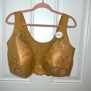This is a Lucy Breeze beige Lacy Bra size 48DD.